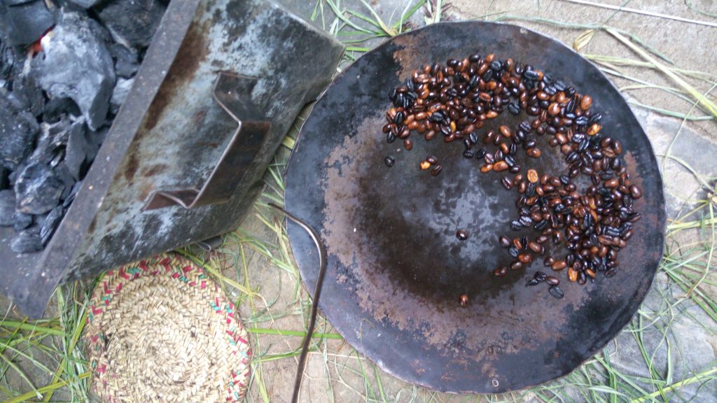 Roasting coffee beans for traditional Ethiopian coffee